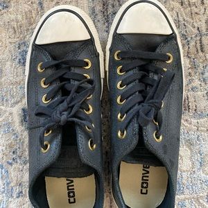 Black and gold leather converse low tops